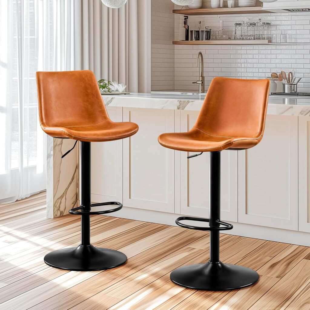 STOOLINK adjustable bar stool set with cognac faux leather seats and black metal base in modern kitchen
